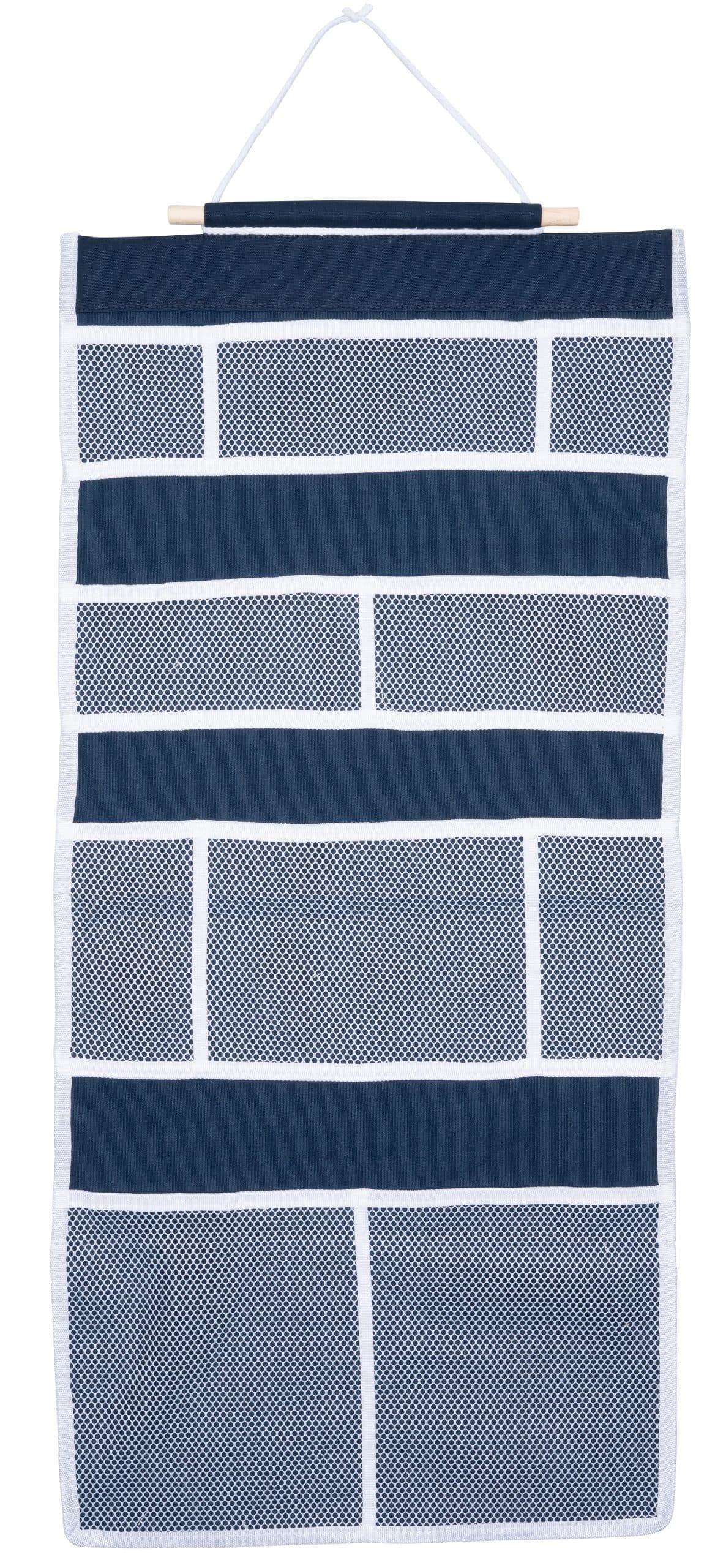 Locker wall caddy with mesh pockets for shipboard storage